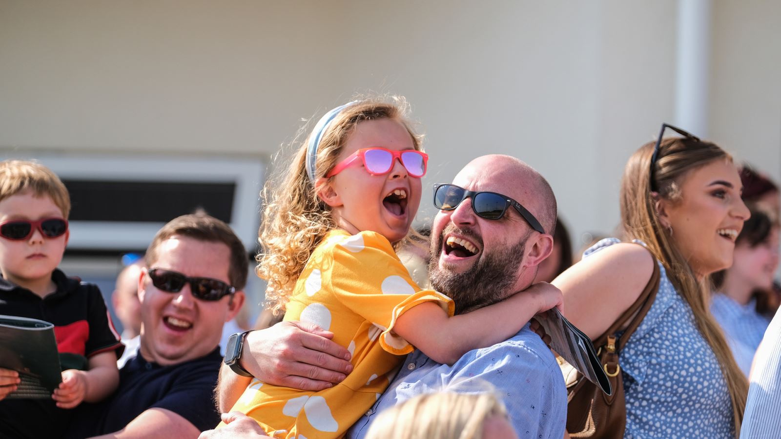 Dad and daughter at Chelmsford City Racecourse Good Friday Festival in Essex